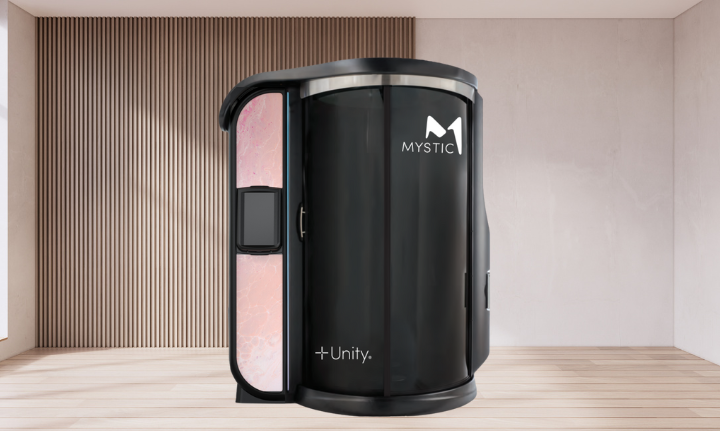 The newest model of Mystic Unity booth rendered in an room with light wood flooring and decorative paneling 